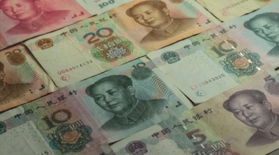 What color is a 100 Renminbi (RMB) note?