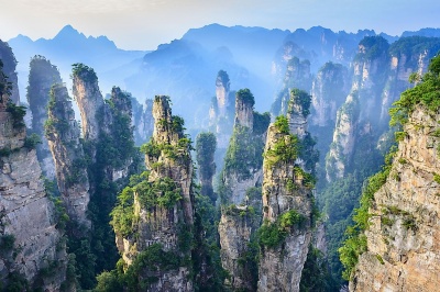 Which Chinese National Forrest Park is famous for its pillar-like rock formations?