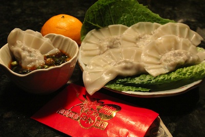 What are some foods Chinese people traditionally eat to celebrate the