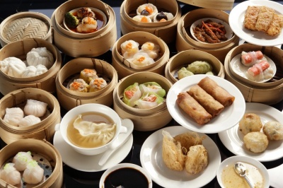 This cuisine is prepared as small bite-sized portions of food served in small steamer baskets or on small plates.